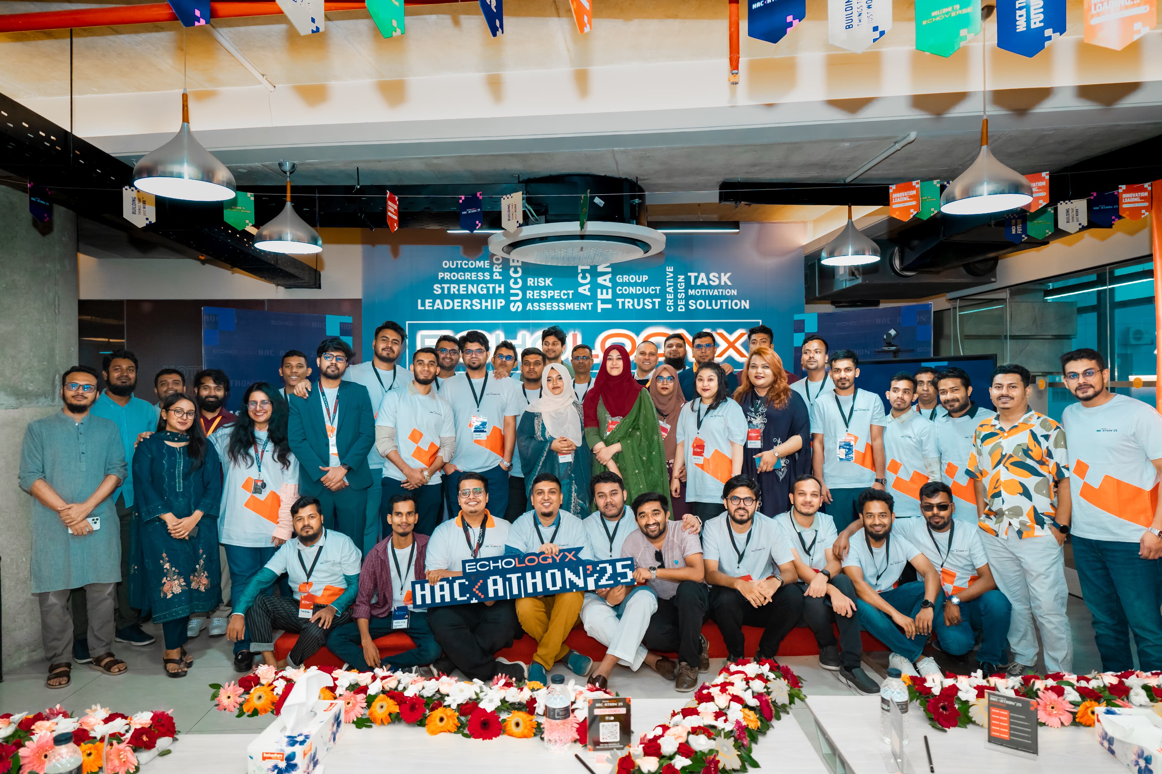 Team celebration with flowers and gifts